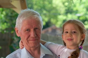 Senior man with his granddaughter